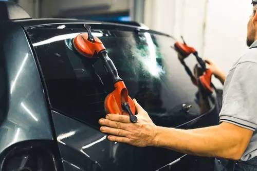 Platinum Auto Glass Repair technician repairing a windshield